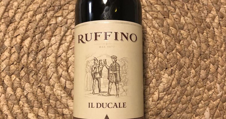 This is a picture of a bottle of Il Ducale Ruffino Toscana 2012 laying down on a table.